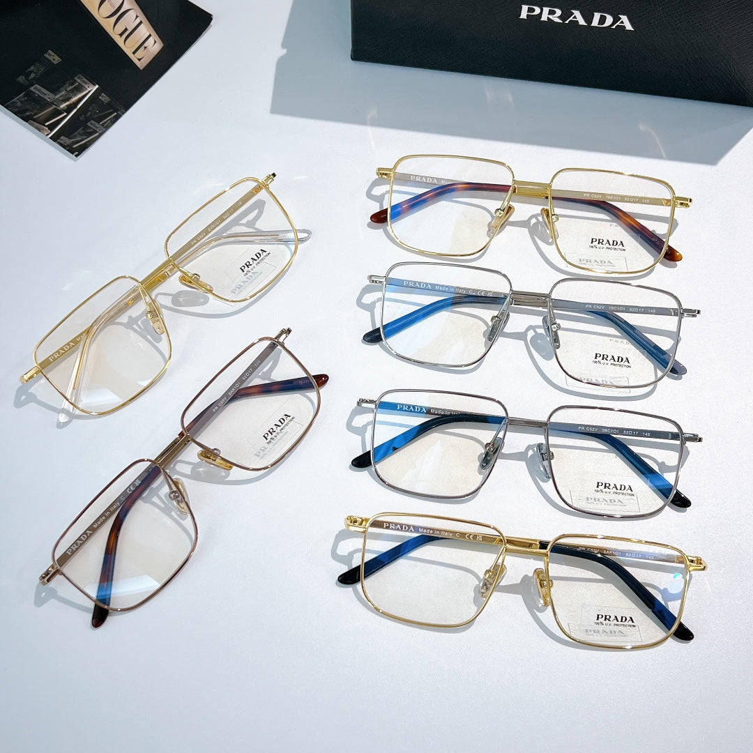 Prada eyeglasses set with mixed gold and silver frames, clear lenses