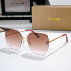 Bvlgari aviator sunglasses with amber lenses and gold metal frame