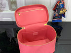 Louis Vuitton pink Epi leather handbag open, showing lined interior and divider panel.