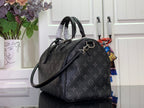Louis Vuitton monogram handbag with shoulder strap and dark leather trim, side view.
