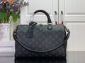 Louis Vuitton monogram handbag with top handles and dark leather trim, front view.