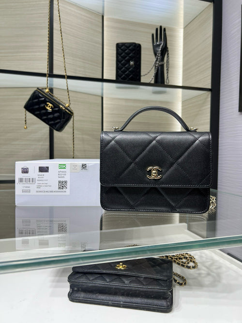 Black quilted flap Chanel bag with gold CC clasp and chain strap