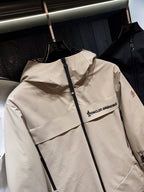 Beige hooded jacket with zip front and chest logo detail