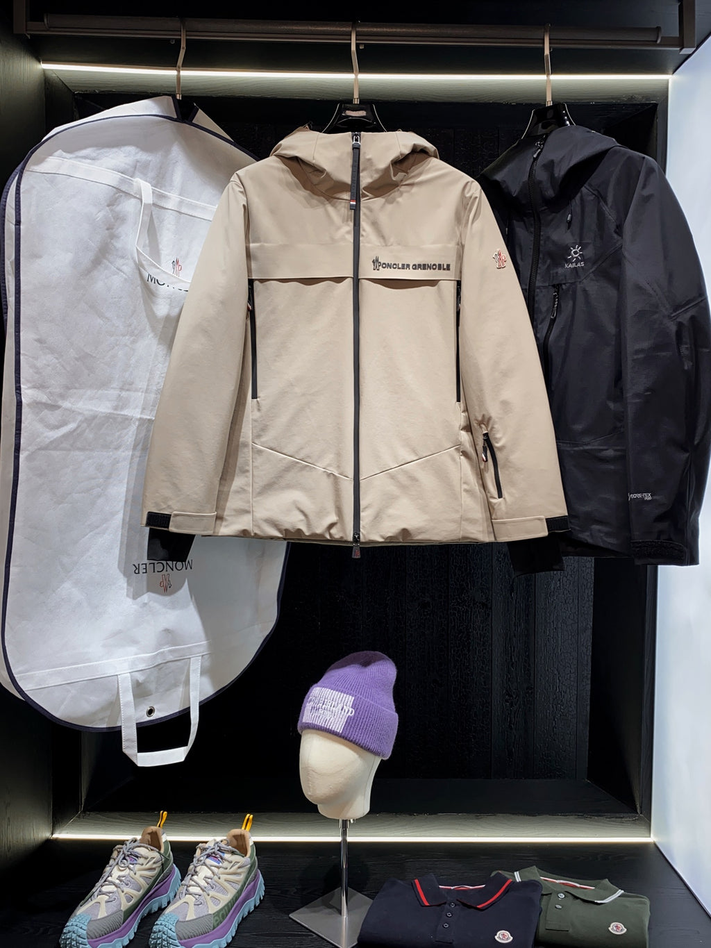 Beige long hooded jacket with full-length zipper and side pockets
