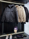 Navy long parka jacket with full-length zipper and attached hood