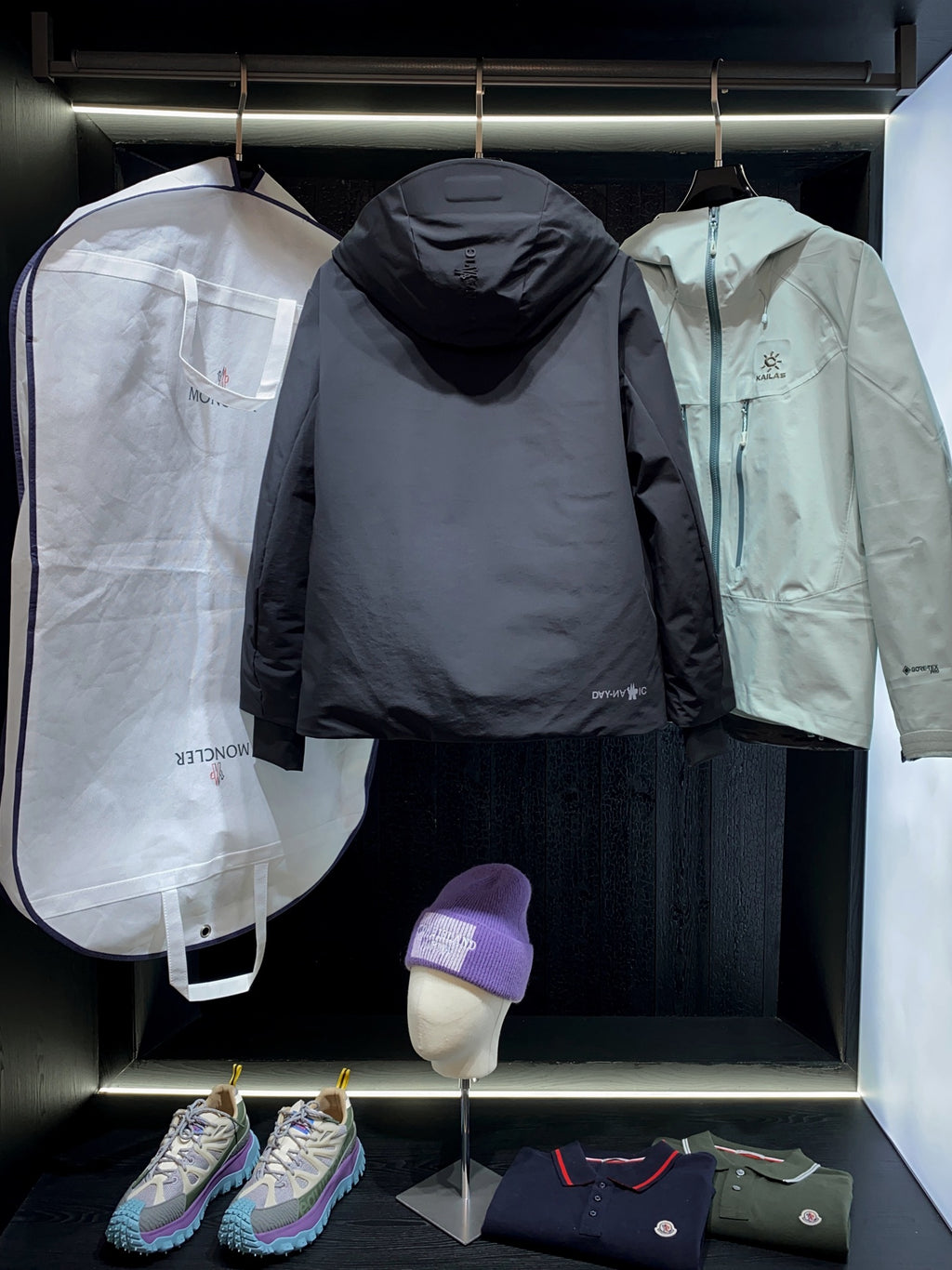 Black long parka jacket with hood and front zipper