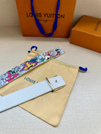 Louis Vuitton belt with white cartoon strap, gold buckle, and tan dust bag included