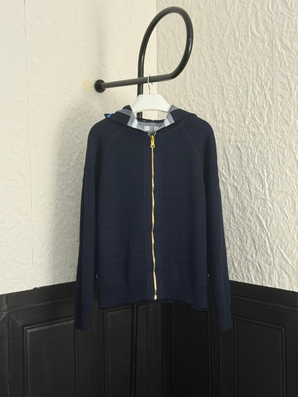 Navy Burberry zip-up hoodie with stand collar and gold zipper