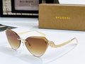 Bvlgari cat-eye sunglasses with gold frame and brown gradient lenses