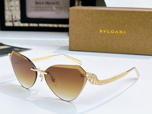Bvlgari cat-eye sunglasses with gold frame and brown gradient lenses