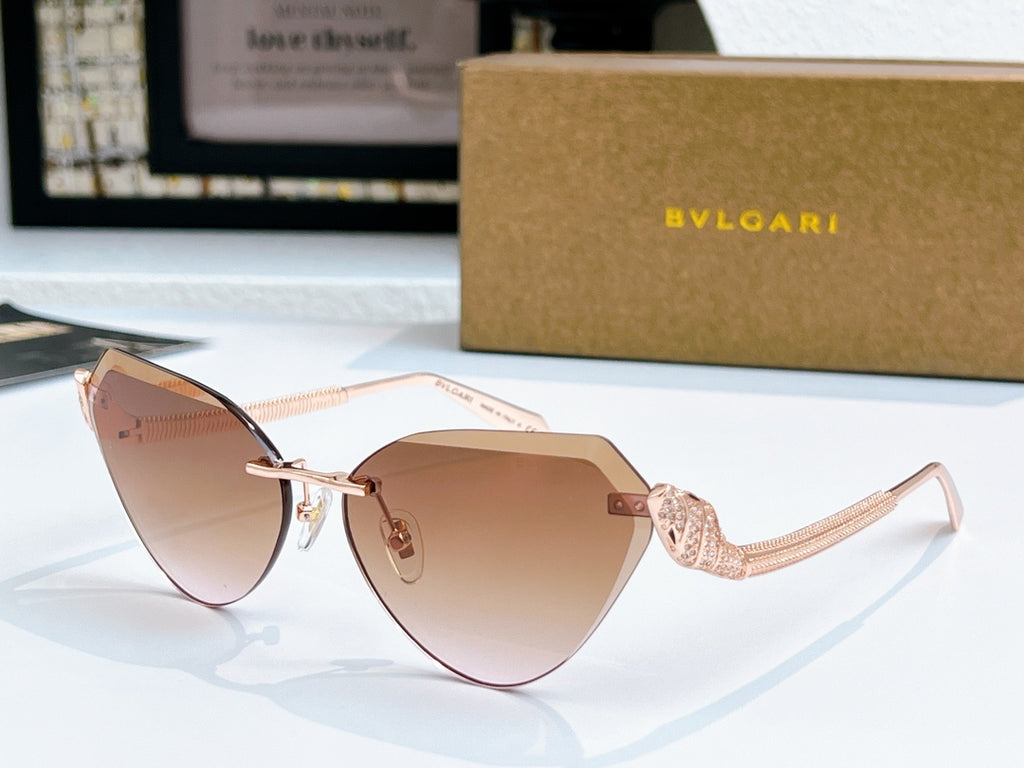 Bvlgari cat-eye sunglasses with rose-gold frame and warm brown gradient lenses