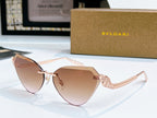 Bvlgari cat-eye sunglasses with rose-gold frame and warm brown gradient lenses