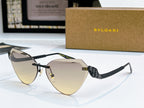 Bvlgari cat-eye sunglasses with black frame and light yellow gradient lenses