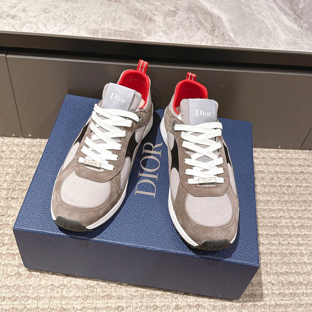 Dior unisex sneakers with beige and white uppers, white laces, and red collar lining