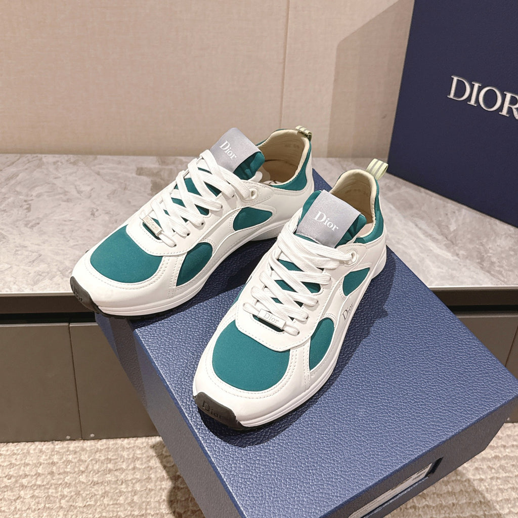 Pair of unisex low-top sneakers, white with teal side panels and white laces