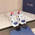 Dior unisex sneakers, white with navy oval panels and red heel accents