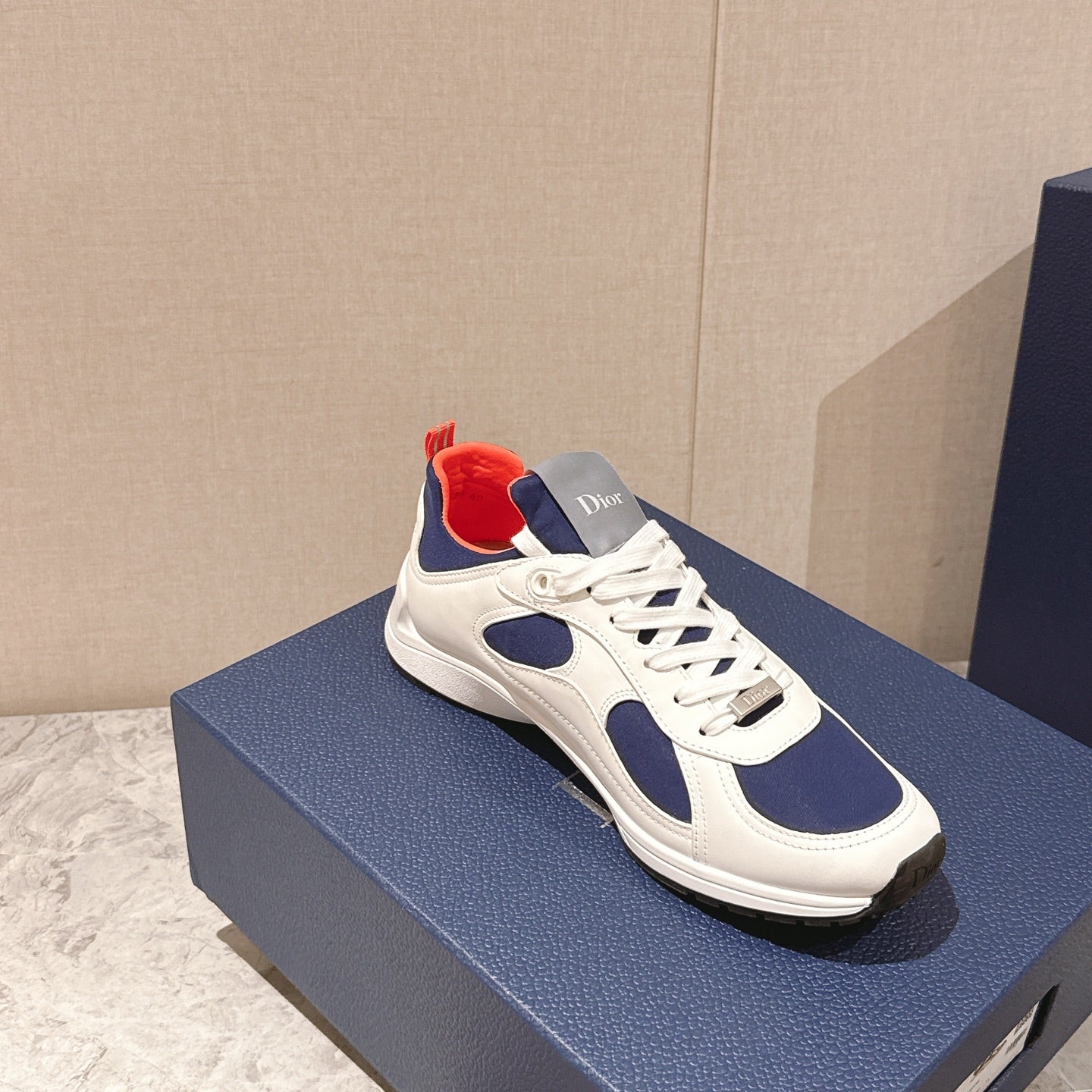 Dior unisex sneakers, white sole with navy side panel and orange-red collar
