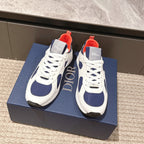 Dior unisex sneakers in white and navy with orange-red tongue and lace panels