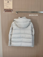 Moncler long white puffer jacket, back view with full hood and horizontal quilting