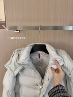 Moncler long white puffer jacket, open neckline with logo patch and zipper detail