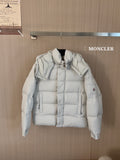 Moncler long white puffer jacket with hood, front snap buttons, and quilted panels