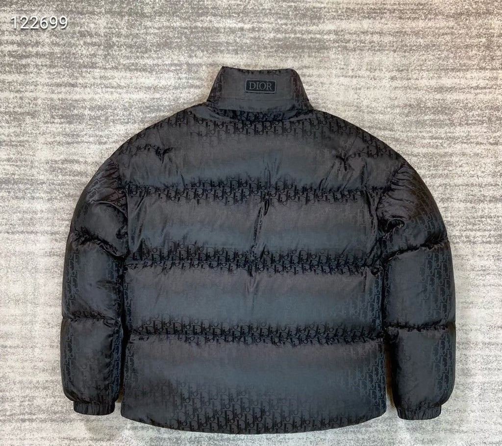 Dior long puffer jacket in dark navy with full front zip and stand collar