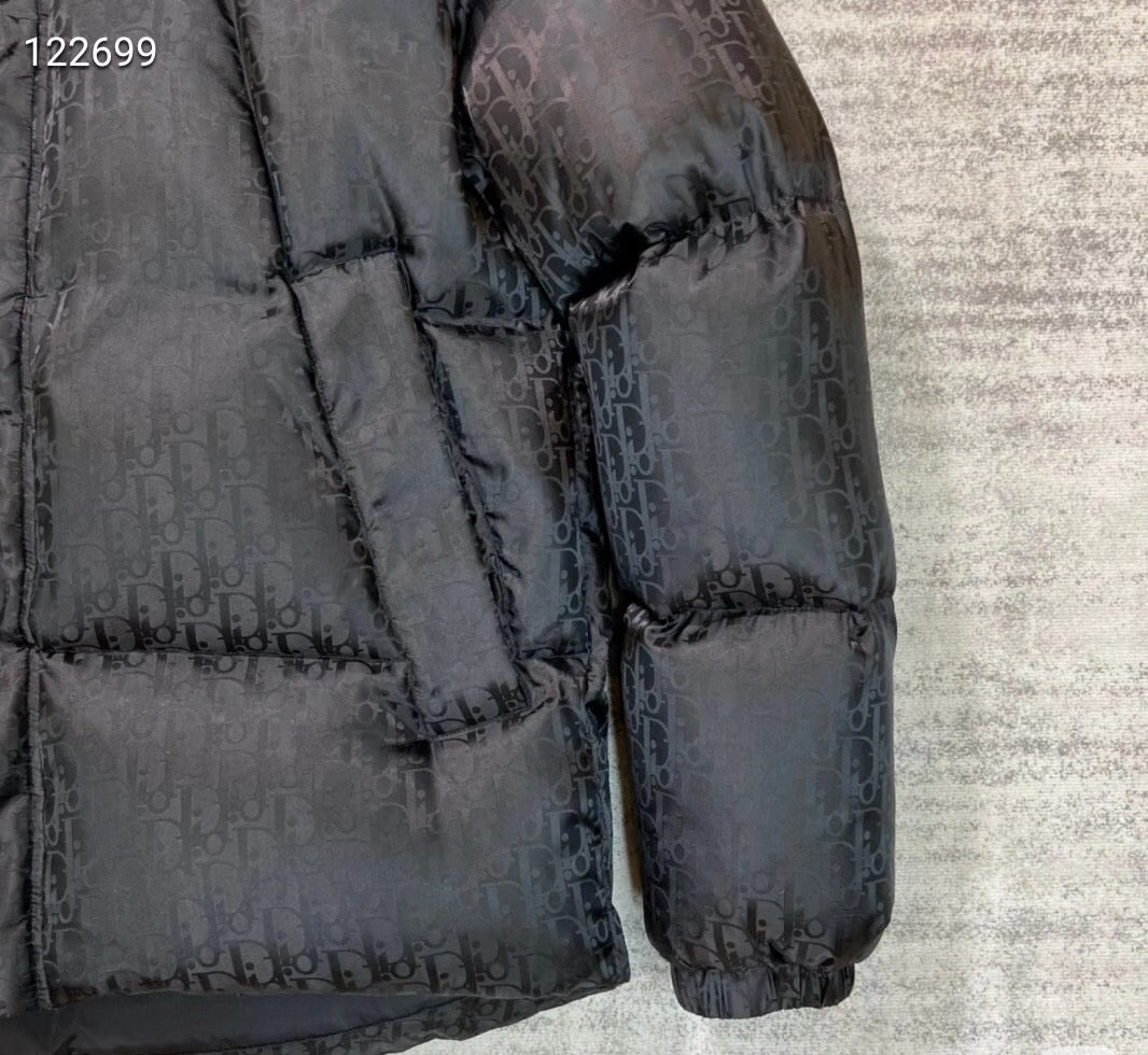 Dior puffer jacket sleeve and cuff in dark navy with quilted stitching