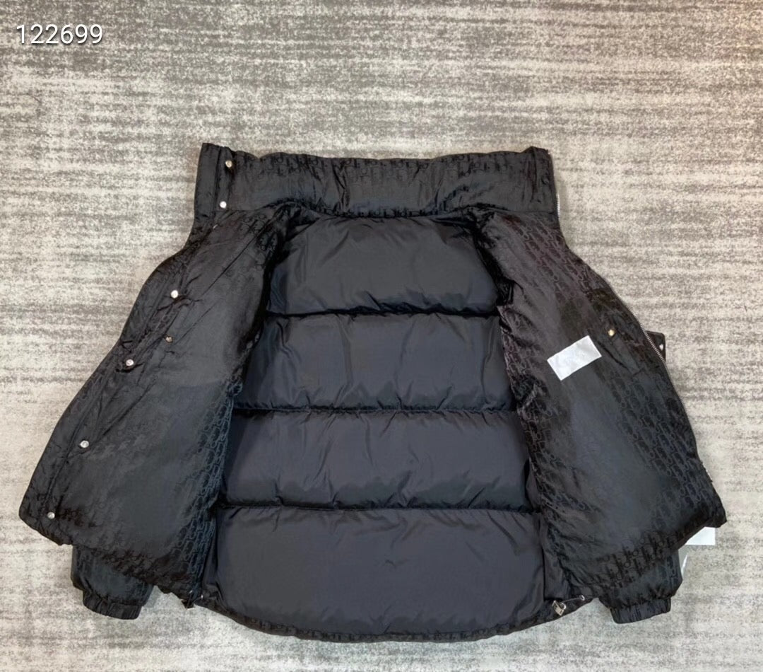 Dior long puffer jacket back view in dark navy with quilted yoke and snaps