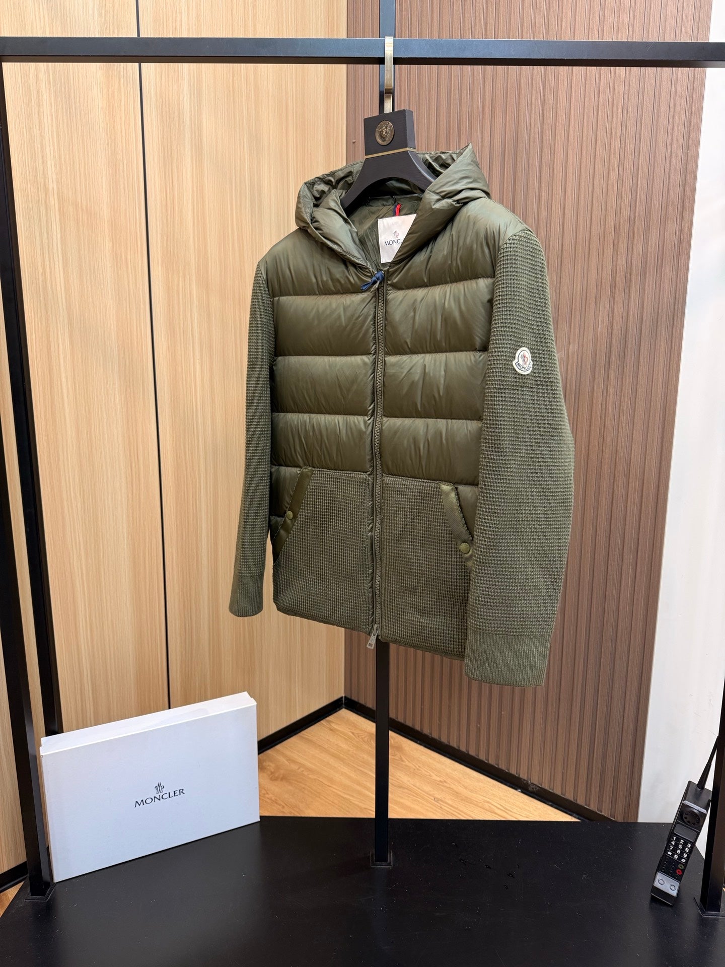 Long puffer jacket in dark olive green, hooded full-zip front