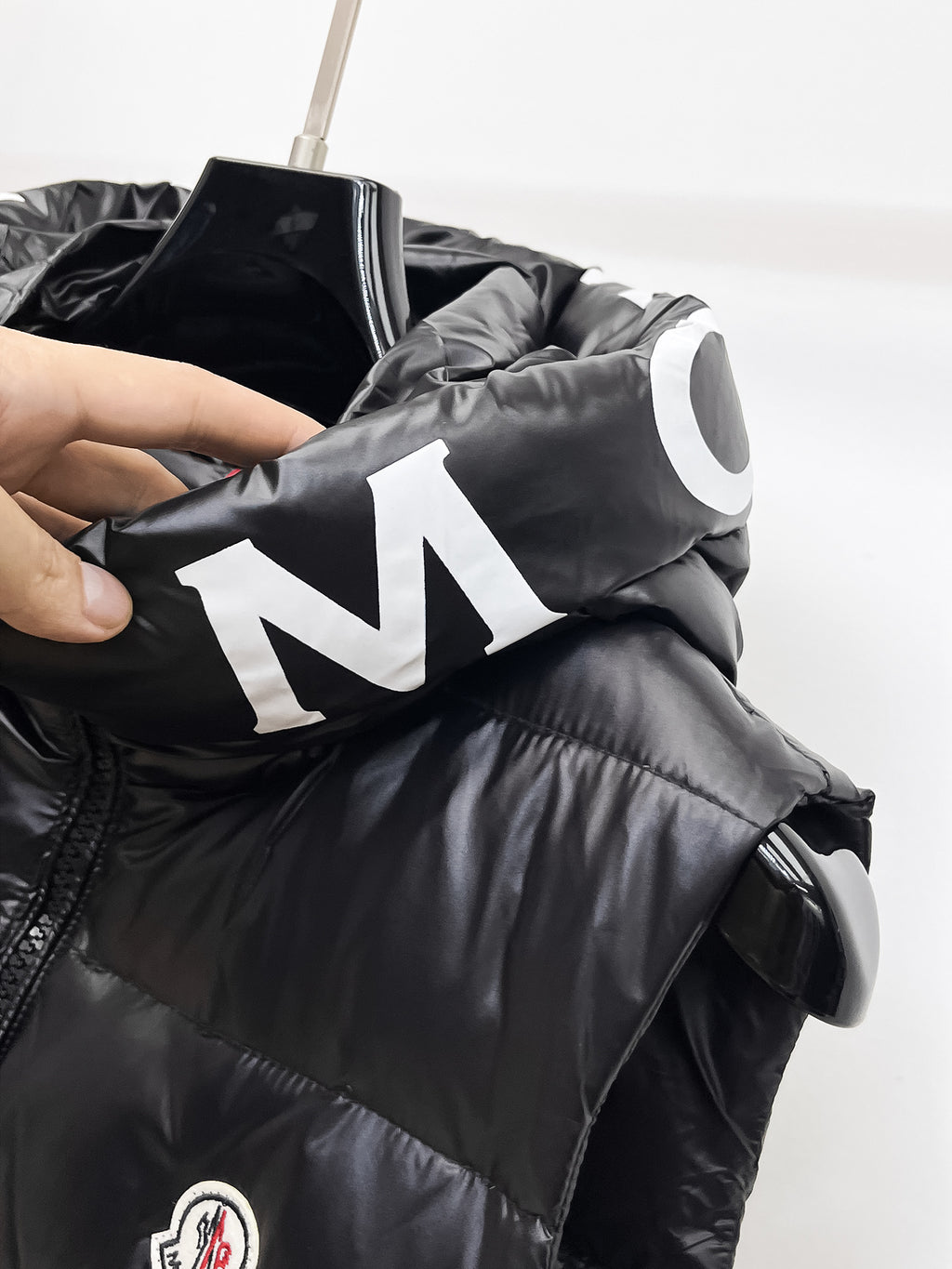 Moncler hooded puffer vest, black hood with large 'N' logo lettering