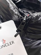 Moncler hooded puffer vest, black zipper pull and fabric with hanging brand tag