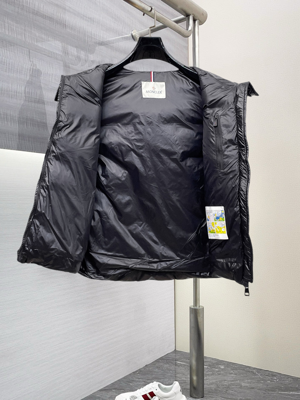 Moncler hooded puffer vest, black interior with hanging tag on chest