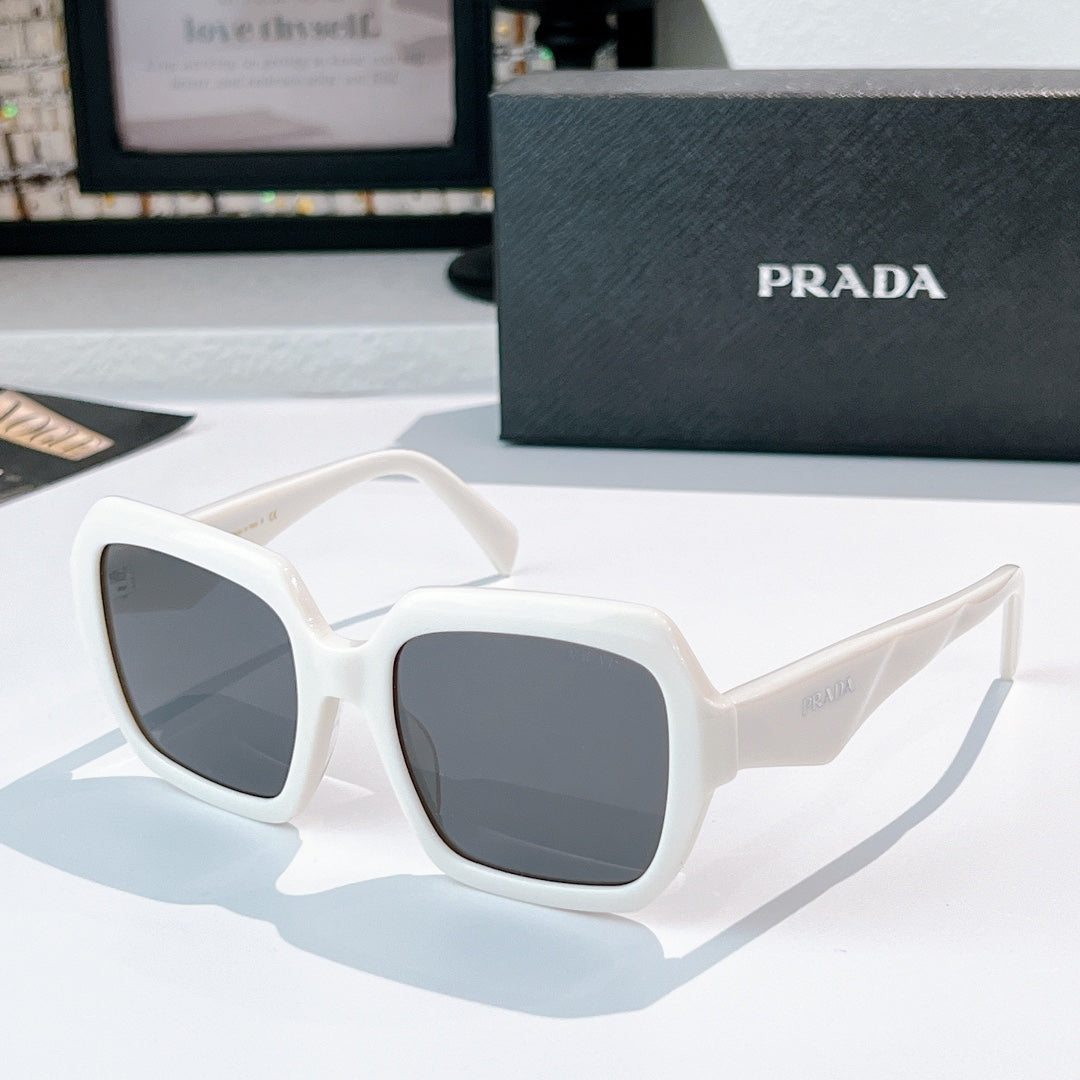 Prada sunglasses with white square frames and dark lenses