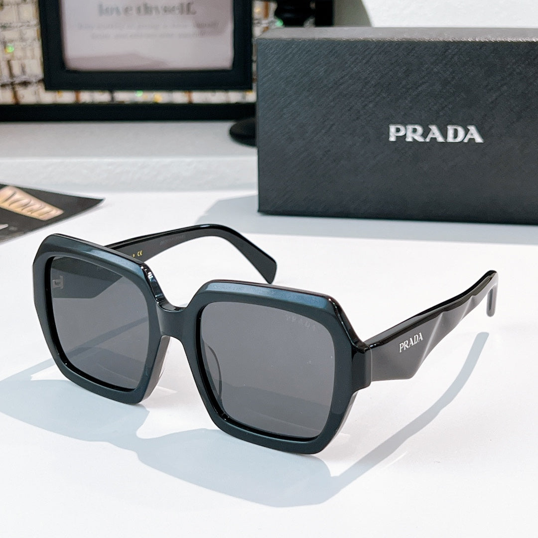 Prada sunglasses with black square frames and gray lenses