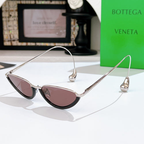Bottega Veneta cat-eye sunglasses with silver frame and mauve tinted lenses