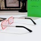 Bottega Veneta sunglasses with pink-tinted lenses, red frame, silver metal hinges