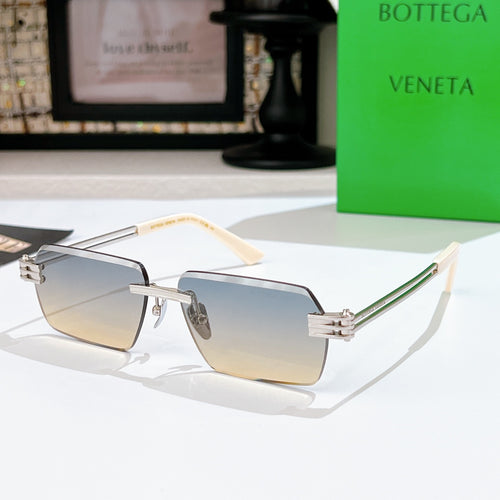 Bottega Veneta sunglasses with light lenses, silver frame, thin gold accents