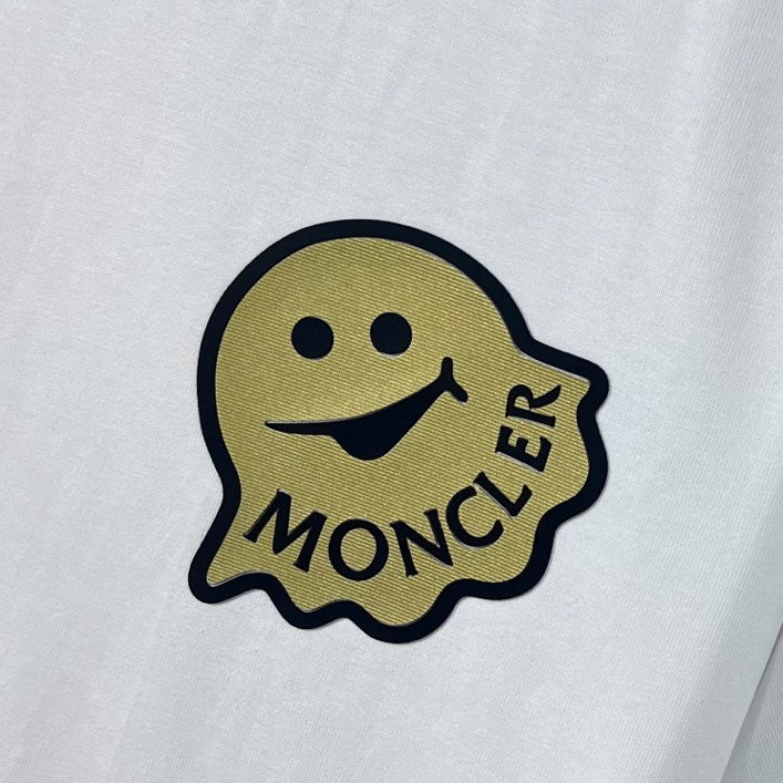 Moncler smile logo patch on white fabric