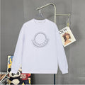Moncler white long-sleeve sweatshirt with crest logo on chest.