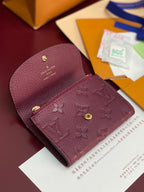 Small Louis Vuitton monogram bag in dark plum leather with flap and gold snap