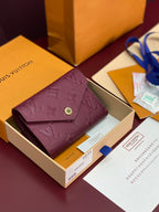 Louis Vuitton small flap bag in burgundy textured leather with gold snap button