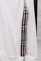White sweatshirt with vertical checkered sleeve stripe panel detail