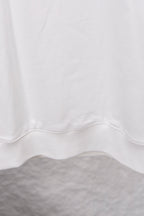 White sweatshirt hem with center seam and ribbed cuff detail