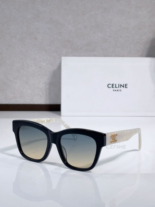 Black sunglasses with gold emblem on temple tips and tinted lenses