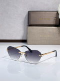 Bvlgari sunglasses with dark blue gradient lenses, gold metal frame, black temples