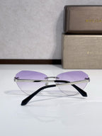 Bvlgari sunglasses side view with purple lenses and black temples, gold metal frame