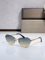 Bvlgari sunglasses with blue gradient lenses, gold metal frame, black temples