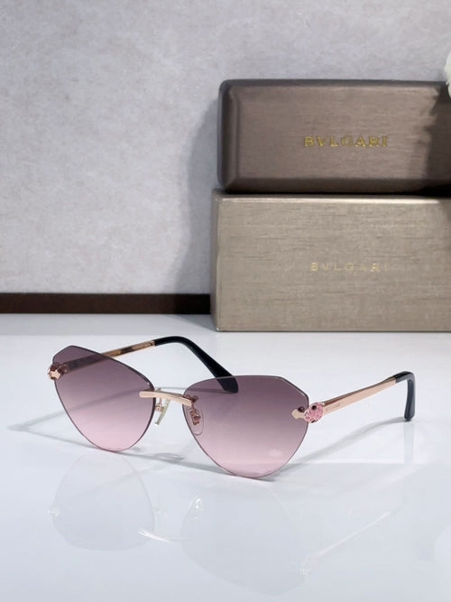 Bvlgari sunglasses with rose/pink gradient lenses, gold metal frame, black temples