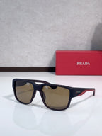 Prada sunglasses, navy frame with brown lenses and red accent stripe on temples