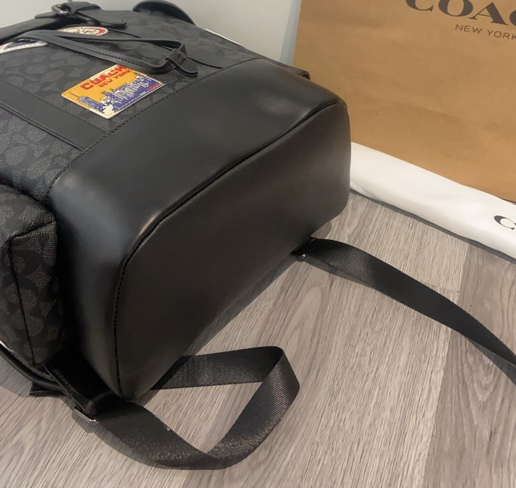 Coah dark monogram backpack with black leather-look top and side strap